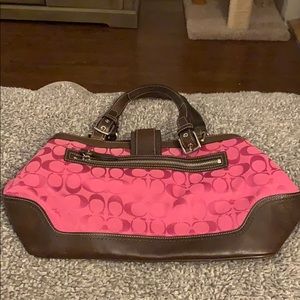 Pink Coach handbag with leather accents